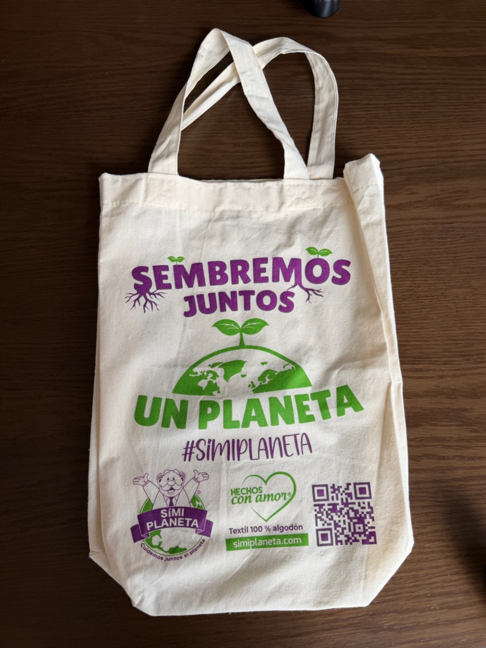 Sembremos Juntos Un Planeta Cotton Tote Bag — Natural with Green & Purple Print